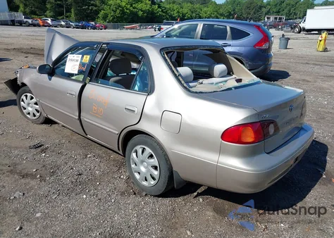 2002 Toyota Corolla Le z USA, uszkodzony, nr VIN 2T1BR12E62C555508